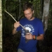 Eco Warrior showing us a 3-week old seedling that will be replanted into the Tembak forest.